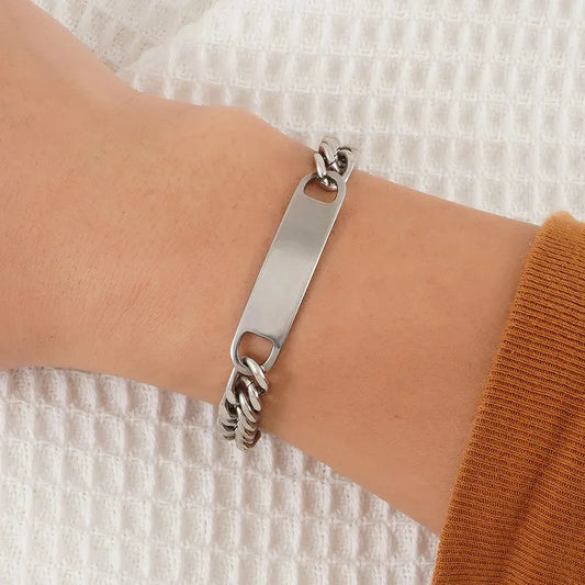 Forge chain link bracelet in silver, worn on wrist