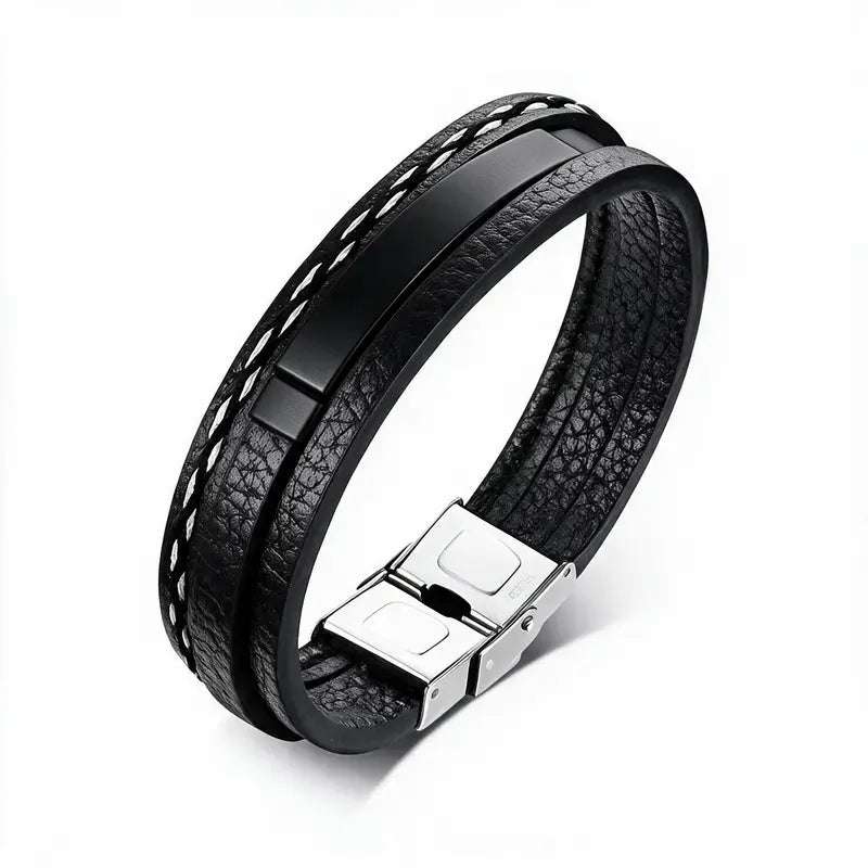 Tailor leather bracelet with black ID plate, product photo on white background.
