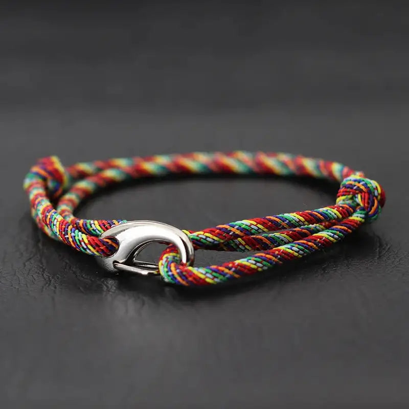 Multicolor rainbow nylon rope bracelet double-wrapped with a curved metal hook clasp