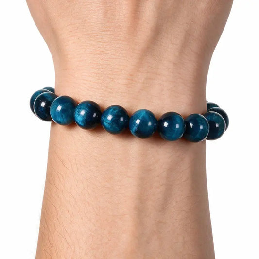 Abyss Blue Tiger Eye Bead Bracelet worn on wrist