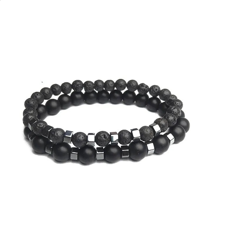 Close-up of the white howlite and black onyx beads in the Duality bracelet set