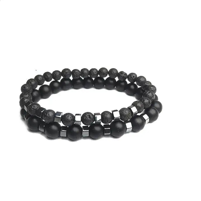 Close-up of the white howlite and black onyx beads in the Duality bracelet set