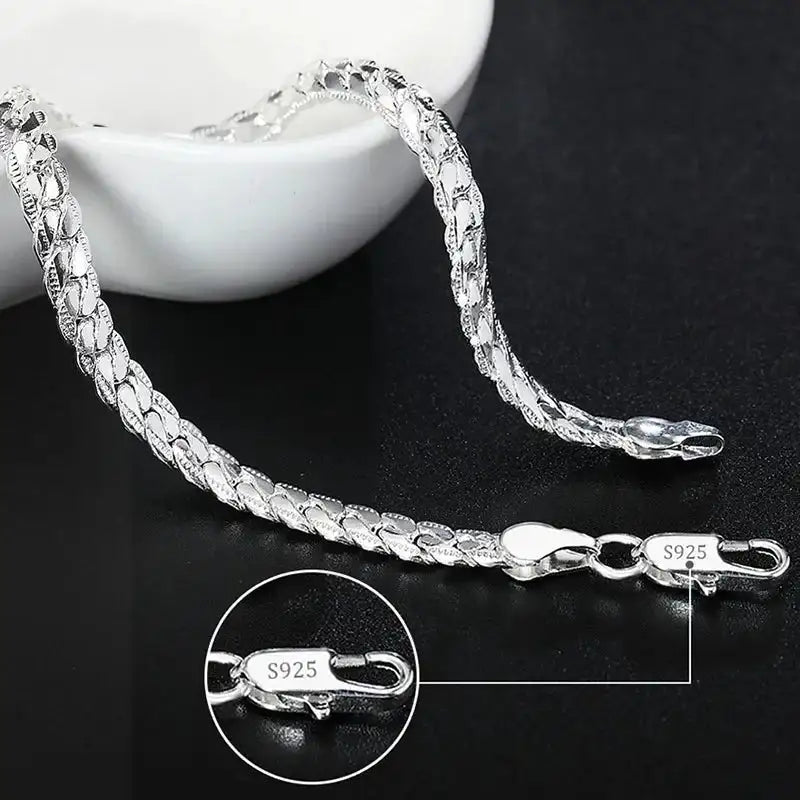 925 sterling silver thin flat herringbone chain bracelet with a lobster clasp