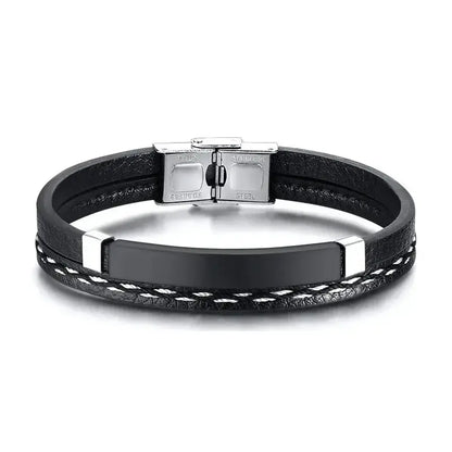 Crest leather bracelet with black ID plate, product photo on white background.