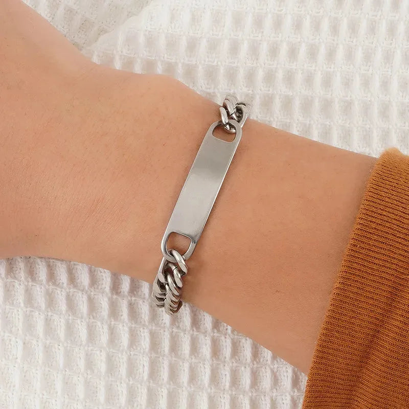 Forge chain link bracelet in silver, worn on wrist