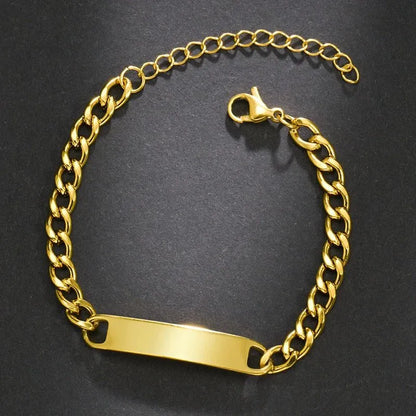 Blank gold nameplate bracelet with a curb chain and lobster clasp, ready for engraving