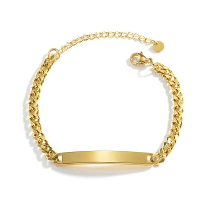 Blank gold nameplate bracelet with a round charm on the clasp chain, on a white background