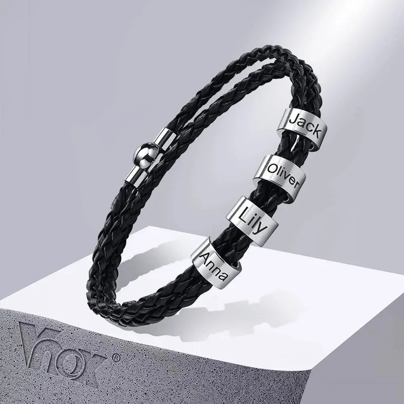 Lineage bracelet with five stainless steel beads engraved with family names