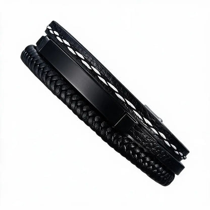 Marlin leather bracelet with black ID plate, product photo on white background.