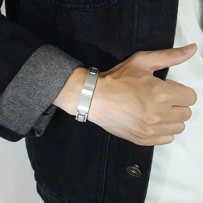 Man wearing the Customised Men's Bracelet – Marshal Line Watch-Band Bracelet in the Silver finish.