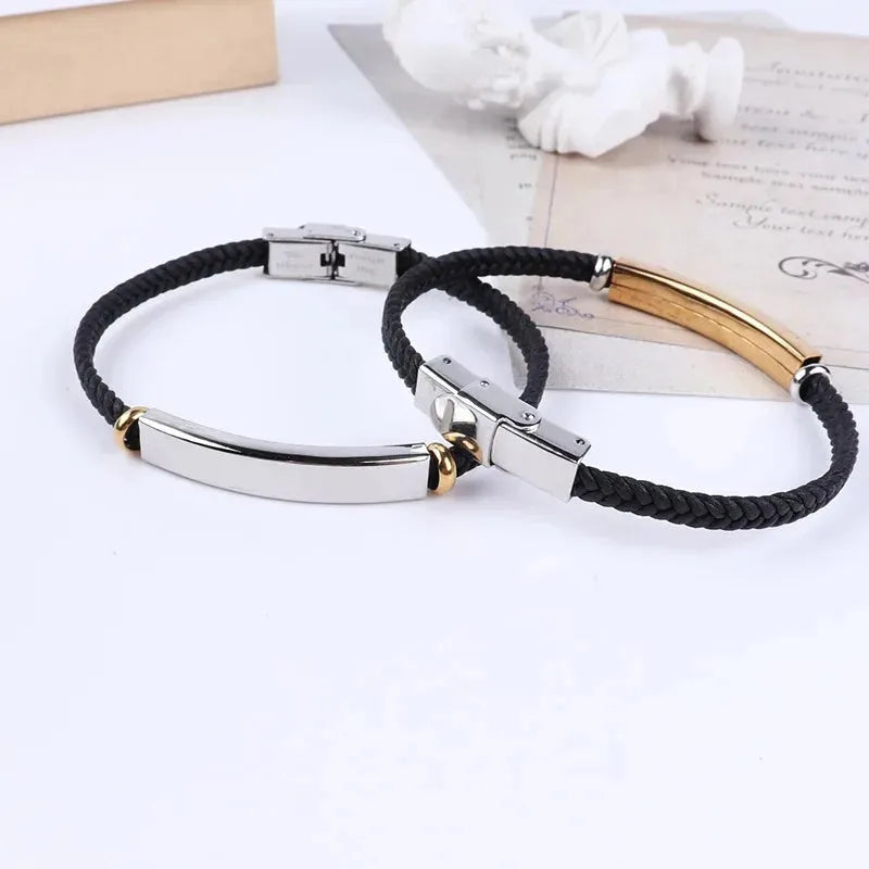 Three Renegade braided cord bracelets with black, silver and gold ID plates