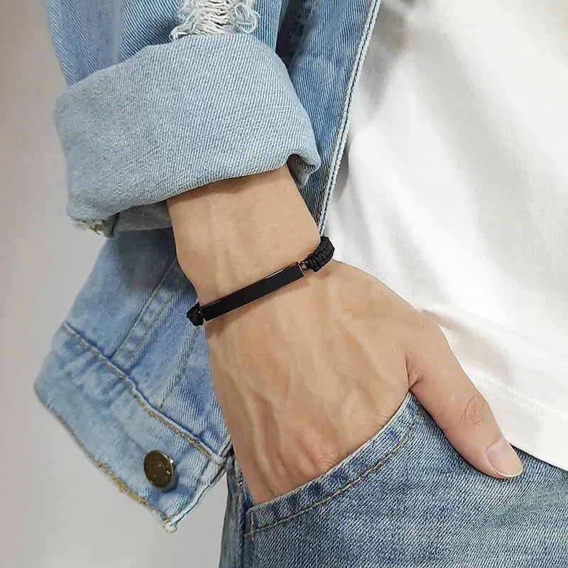 Close-up of a hand wearing the Solace memorial cord bracelet