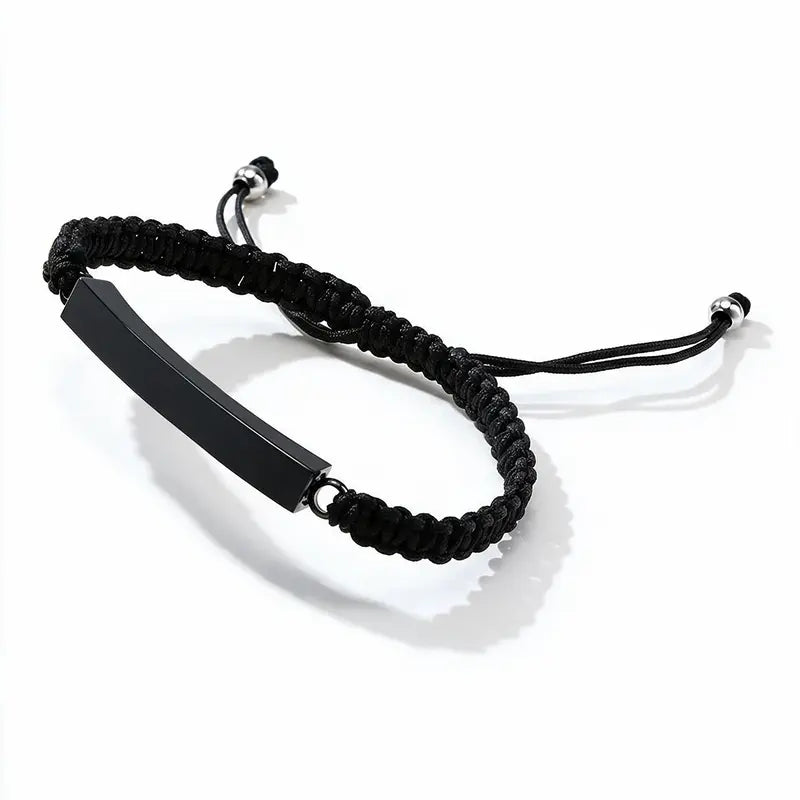 Solace adjustable cord bracelet with black ID bar, product photo on white background.