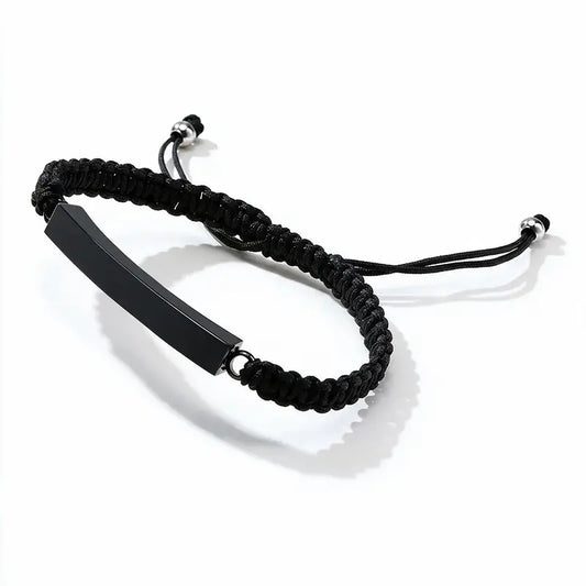 Solace adjustable cord bracelet with black ID bar, product photo on white background.
