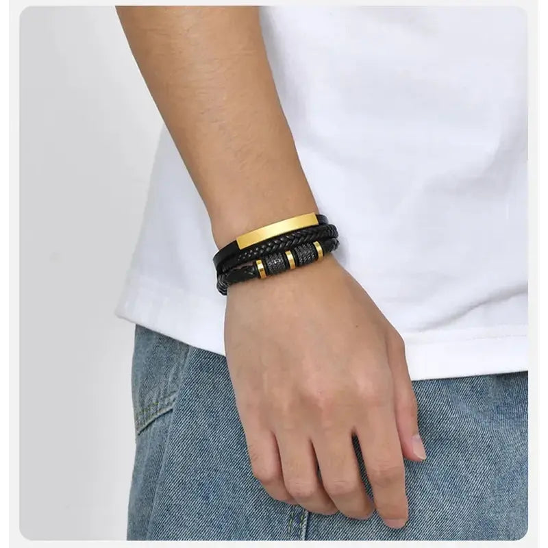 Vanguard braided leather bracelet worn on a man's wrist, close-up
