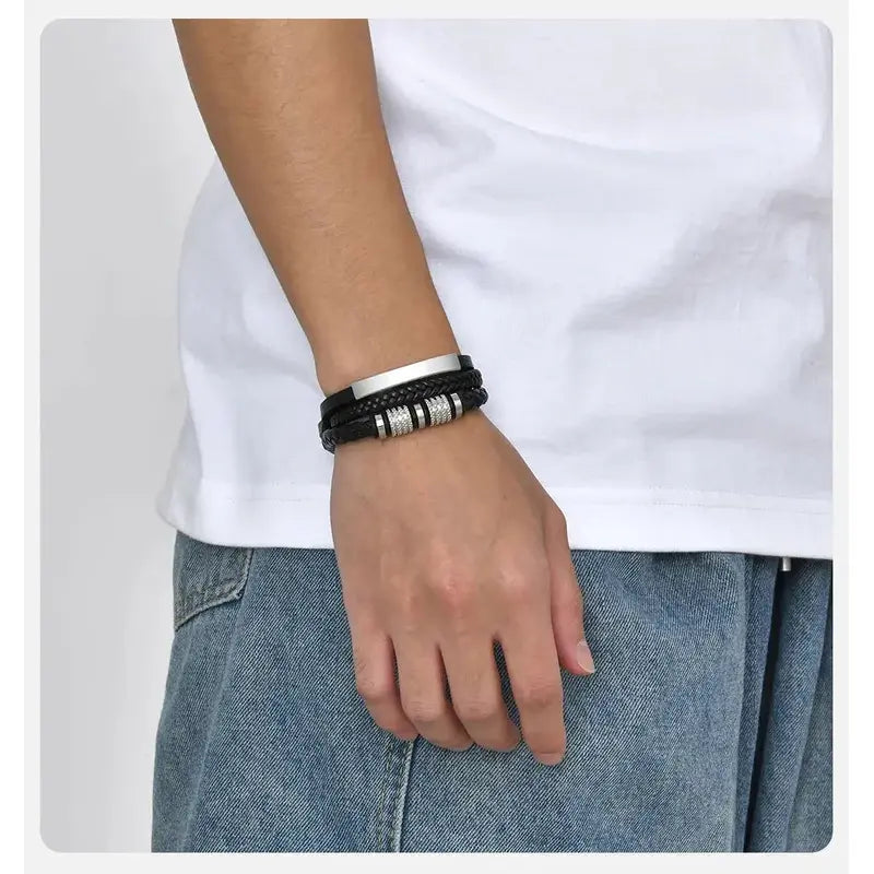Vanguard braided leather bracelet worn on a man's wrist