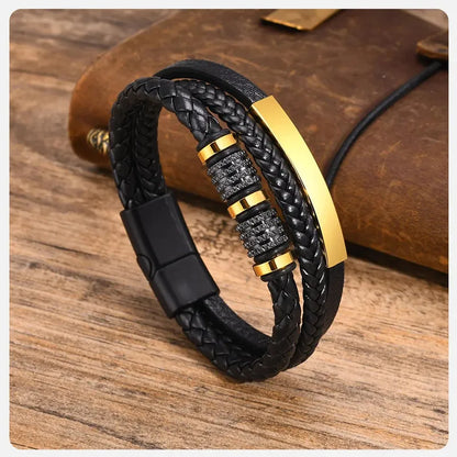 Close-up of the ID bar and beads on the Customised Men's Bracelet – Vanguard Braided Leather Bracelet, Gold finish.
