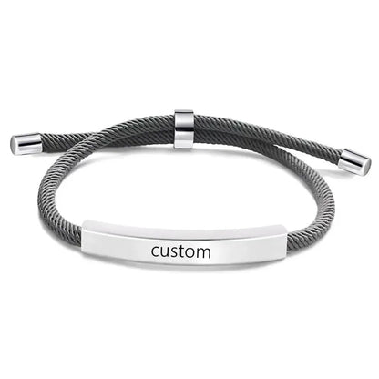 Voyager adjustable cord bracelet in grey with silver-tone nameplate, engraved custom text