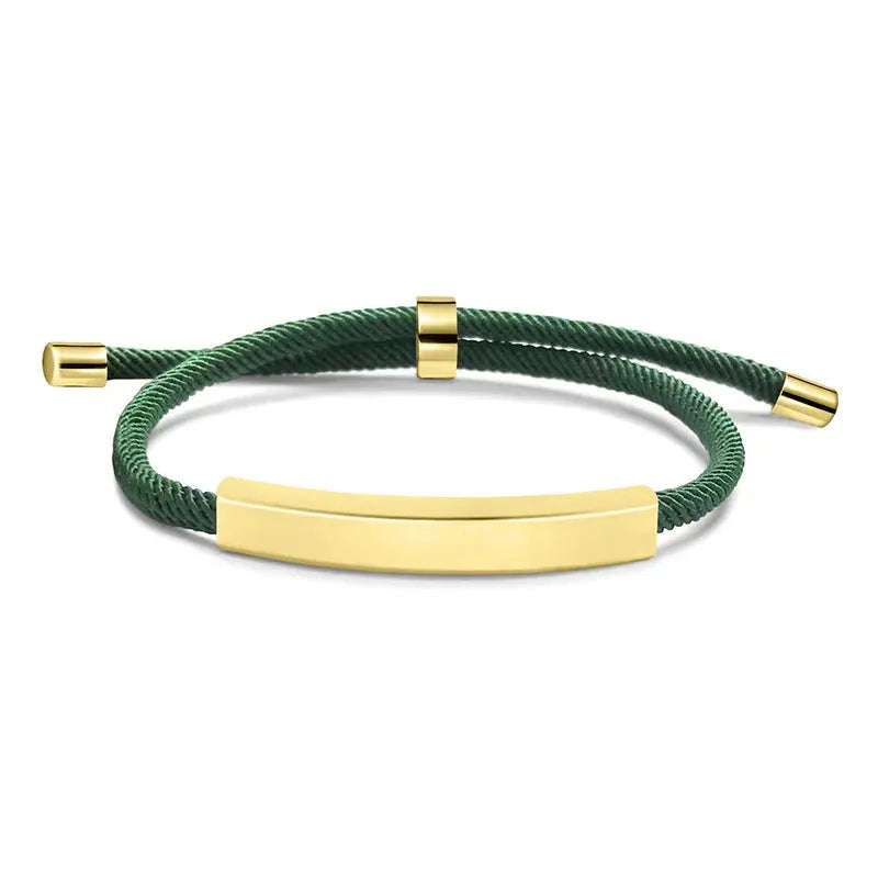 Voyager adjustable cord bracelet in green with gold-tone nameplate