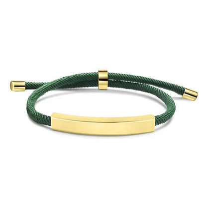 Voyager adjustable cord bracelet in green with gold-tone nameplate