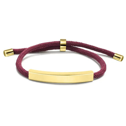 Voyager adjustable cord bracelet in wine with gold-tone nameplate