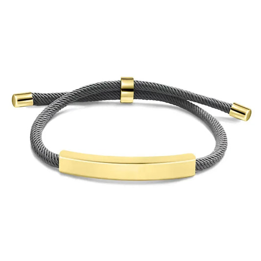 Voyager adjustable cord bracelet in grey with gold-tone nameplate