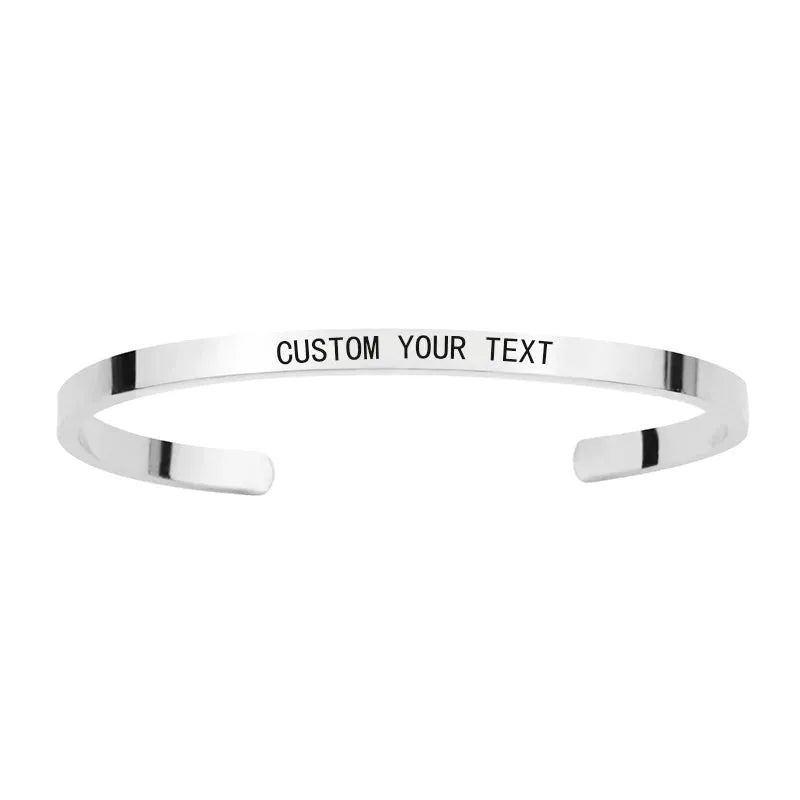 Customised Men's Bracelet – Whisper Cuff Bangle in Silver with a "CUSTOM YOUR TEXT" engraving demo.