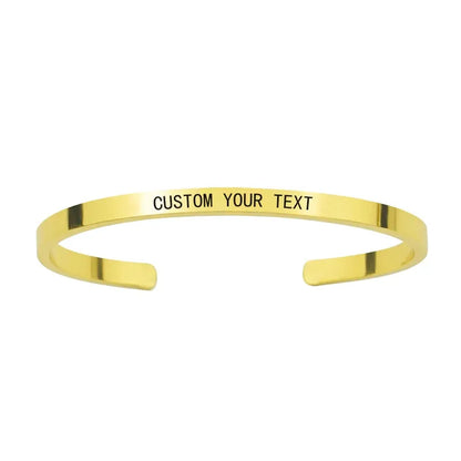 Customised Men's Bracelet – Whisper Cuff Bangle in Gold with a "CUSTOM YOUR TEXT" engraving demo.