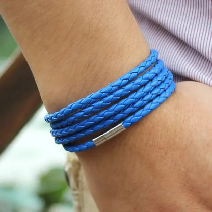 Blue braided leather bracelet wrapped five times around the wrist