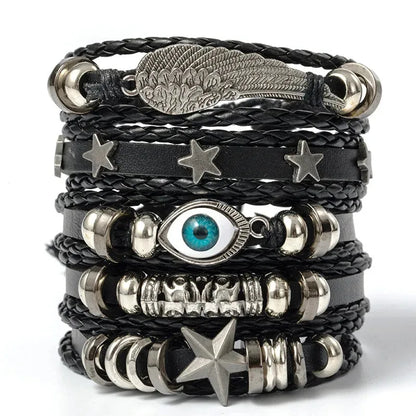 Five-piece evil eye leather bracelet stack with a feathered wing charm and star charm, on a white background.