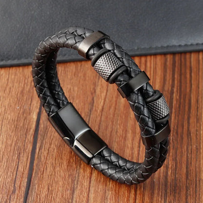 Multi-strand black leather bracelet with ribbed metal beads in black finish, on a white background