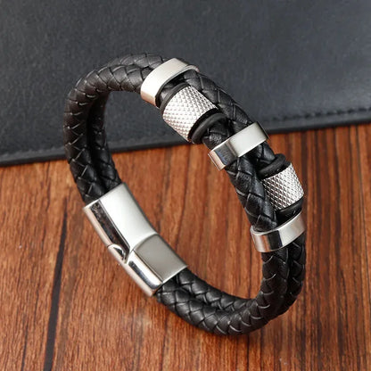 Multi-strand silver leather bracelet with ribbed metal beads in silver finish, on a white background
