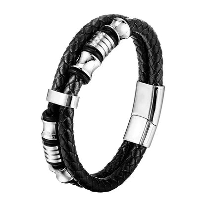 Multi-strand leather bracelet with scattered silver metal rings, on a white background