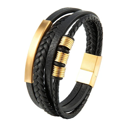 Multi-strand brown leather bracelet with ribbed metal beads in gold finish, on a white background