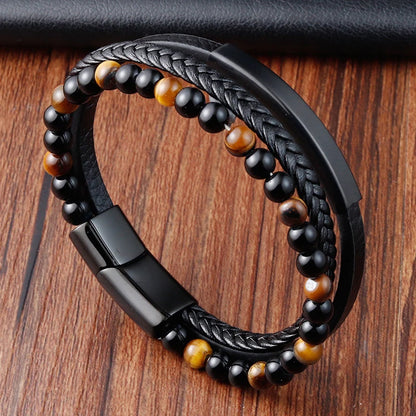 Multi-strand black leather bracelet with gold tiger eye beads and black beads