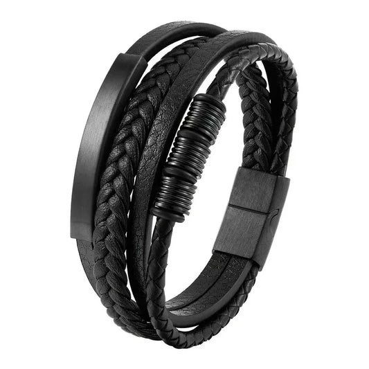Multi-strand black leather bracelet with a matte black metal bar and black ring discs, on a white background