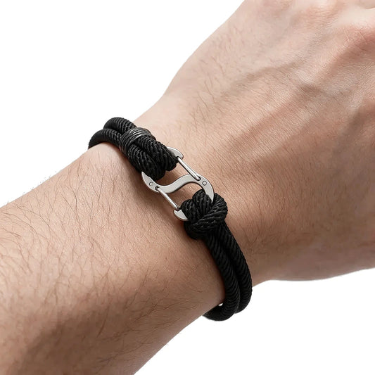 Current Milan Cord Bracelet, black rope with silver hook clasp, worn on wrist