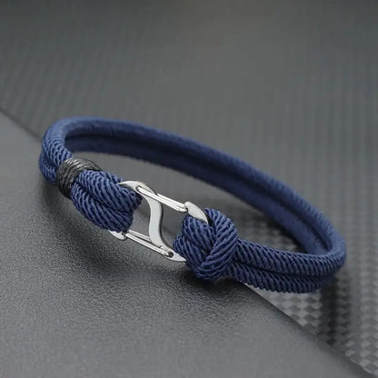 Navy double-strand Milan cord bracelet with a polished stainless steel oval clasp