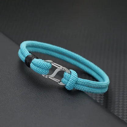 Light blue double-strand Milan cord bracelet with a stainless steel oval clasp