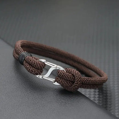 Brown double-strand Milan cord bracelet with a stainless steel oval clasp
