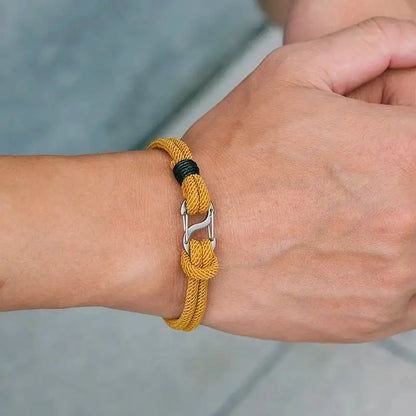 Dark blue Milan cord bracelet worn on the wrist