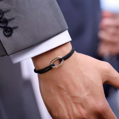 Black nylon cord bracelet with an alloy spring-clip clasp