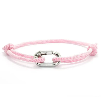 Pink nylon cord bracelet with an alloy spring-clip clasp