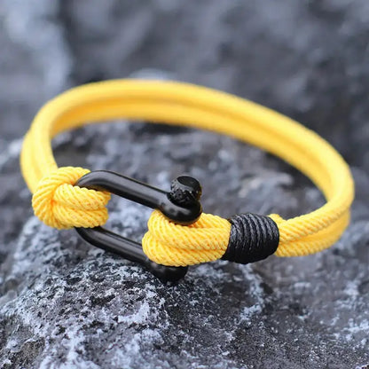 Yellow double-strand Milan rope bracelet with a stainless steel shackle clasp