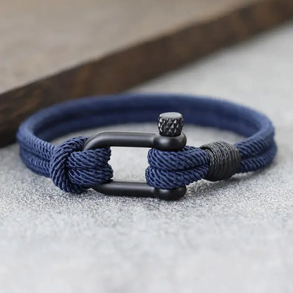 Navy double-strand Milan rope bracelet with a stainless steel shackle clasp