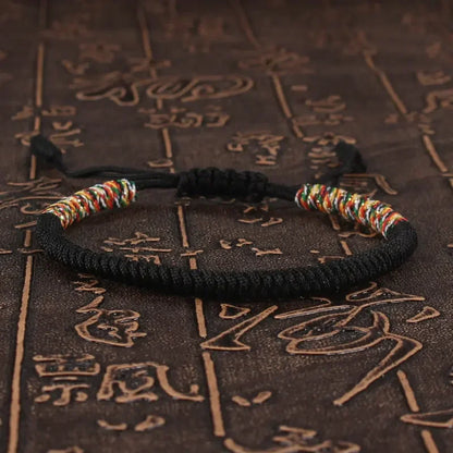 Black braided cord bracelet hand-knotted with the King Kong knot