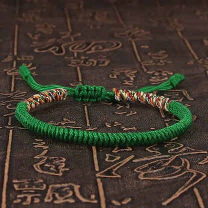Green braided cord bracelet hand-knotted with the King Kong knot