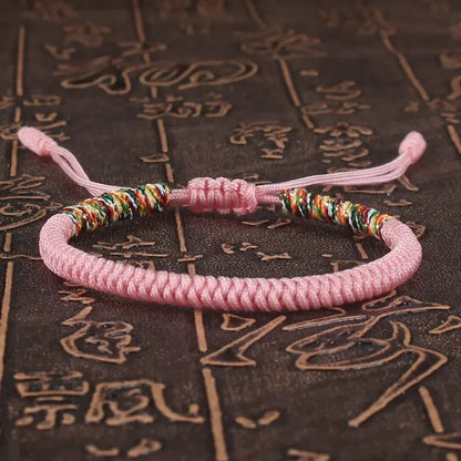 Pink braided cord bracelet hand-knotted with the King Kong knot