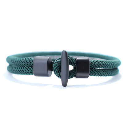 Green double-strand Milan mesh rope bracelet with a black T-bar clasp