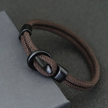 Brown nylon rope bracelet double-wrapped with a black alloy hook clasp